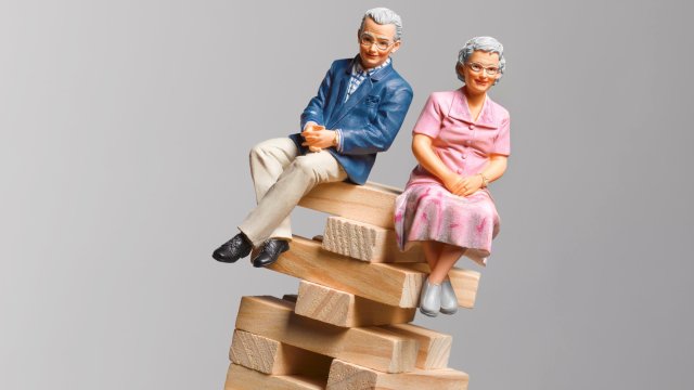 Article thumbnail: pensioners sitting in a dangerous position unbalanced about to fall, implying problems with pensions falling in value and the cost of retirement