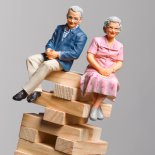 Article thumbnail: pensioners sitting in a dangerous position unbalanced about to fall, implying problems with pensions falling in value and the cost of retirement