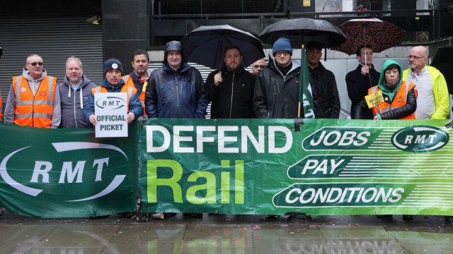 Article thumbnail: Mick Lynch, general secretary of the Rail, Maritime and Transport union (RMT), joins union members on the picket line outside Euston station in London during a rail strike in a long-running dispute over jobs and pensions. (Photo: Jeff Moore/PA Wire)