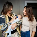 Article thumbnail: Happy caucasian woman visiting her sister and newborn son at home