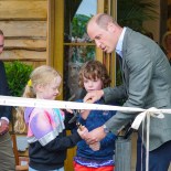 Article thumbnail: LOSTWITHIEL, CORNWALL - JULY 10: Prince William, Prince of Wales helps brother and sister James and Violet Scott to cut the ribbon as he visits The Duchy Of Cornwall Nursery to open The Orangery restaurant on July 10, 2023 in Lostwithiel, United Kingdom. Prince William visits The Duchy Of Cornwall Nursery to open The Orangery restaurant, which has been built as part of a nine-month extension project to create sustainable visitor spaces at the garden centre. (Photo by Hugh Hastings - WPA Pool / Getty Images)