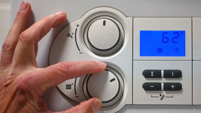 Article thumbnail: A photo shows the adjustment wheel of a gas boiler in a flat in Dortmund, western Germany, on October 4, 2022. - Eurozone consumer prices skyrocketed by a record 10 percent in September, official data showed on September 30, 2022, as inflation reached double digits on the back of soaring energy prices caused by Russia's war on Ukraine. (Photo by Ina FASSBENDER / AFP) (Photo by INA FASSBENDER/AFP via Getty Images)