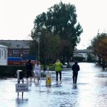 Article thumbnail: A view of the entrance to the Riverside Caravan Centre in Bognor Regis which has flooded after heavy rain the area. Residents in the South West are being warned of "significant coastal flooding" amid heavy rain and strong winds. The Environment Agency has issued 72 flood warnings as the latest band of bad weather hits the country. Picture date: Sunday October 29, 2023. PA Photo. Photo credit should read: Andrew Matthews/PA Wire