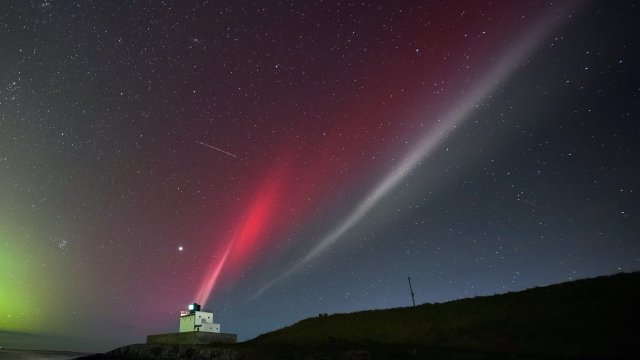 Article thumbnail: A strong thermal emission velocity enhancement, a rare aurora-like phenomenon named a STEVE in 2016 by scientists in Canada, can be seen over Bamburgh castle, in Northumberland on the North East coast of England. The atmospheric optical phenomenon is caused by a flowing ribbon of hot plasma breaking through into the earth's ionosphere, appearing in the sky as a purple, red and white arc. Picture date: Sunday November 5, 2023. PA Photo. See PA story WEATHER Aurora. Photo credit should read: Owen Humphreys/PA Wire