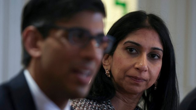 Article thumbnail: FILE - Britain's Prime Minister Rishi Sunak, left, and Britain's Home Secretary Suella Braverman, attend a meeting with the local community and police leaders following the announcement of a new police task force to help officers tackle grooming gangs, in Rochdale, England, Monday, April 3, 2023. British Prime Minister Rishi Sunak has fired Home Secretary Suella Braverman, who drew anger for accusing police of being too lenient with pro-Palestinian protesters. The government says Braverman has left her job as part of a Cabinet shuffle on Monday, Nov. 13, 2023. (Phil Noble/Pool Photo via AP, File)