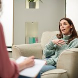 Article thumbnail: woman in therapy session